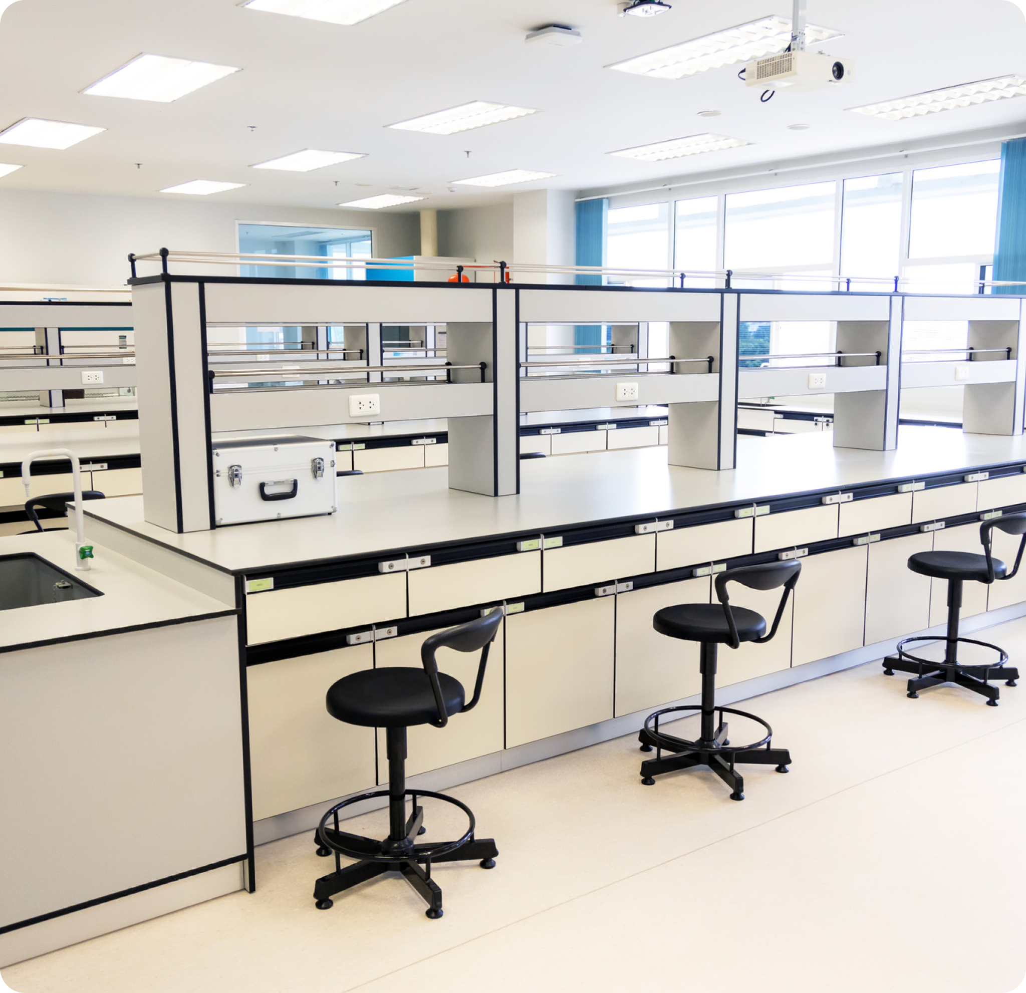 A lab with chairs and tables in it